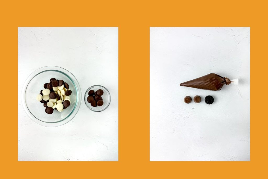 Two bowls with chocolate chips on the left; on the right, a piping bag and three round candies are arranged on a white surface with an orange background.